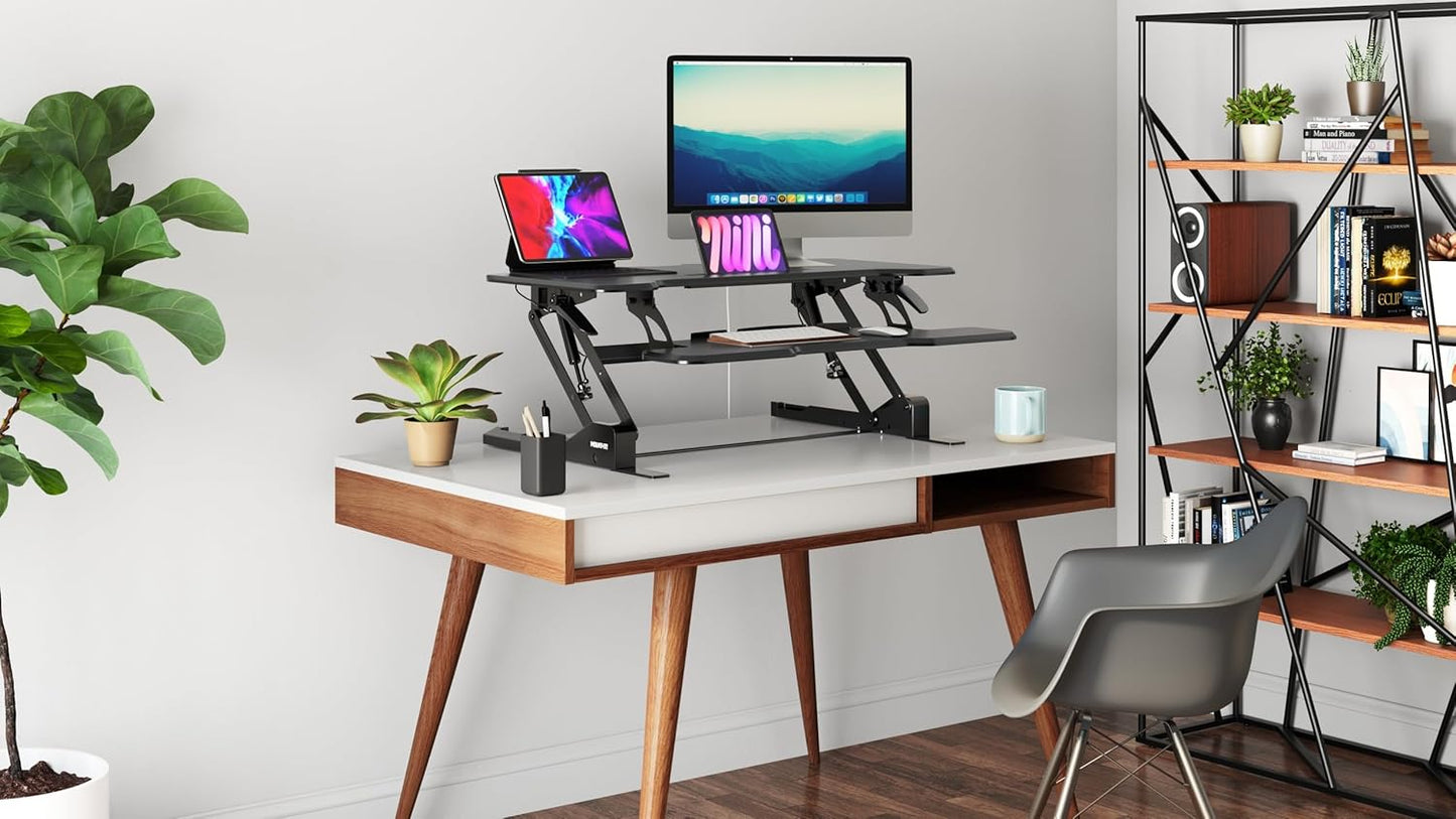 Mount-It! Height Adjustable Standing Desk Converter, 38” Wide, Stand Up Desk Riser for 2 Monitors, Manual Gas Spring Desktop Raises to 16.9", Fits Two Monitor Screens with Keyboard Mouse Tray in Black